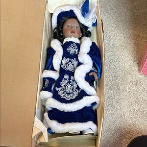 Porcelain dolls Elegant Winter Doll in Blue and White Ensemble